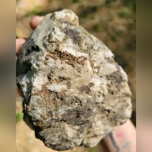 Quartz With Pyrite, Muscavite And Other Inclusions.